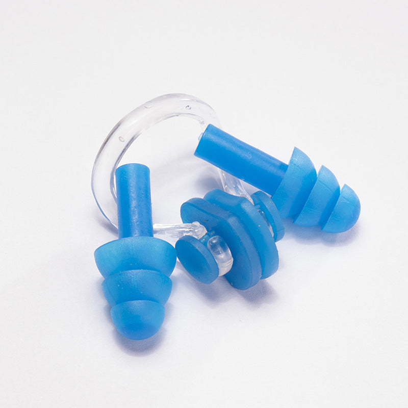 One-piece swimming goggles with earplugs