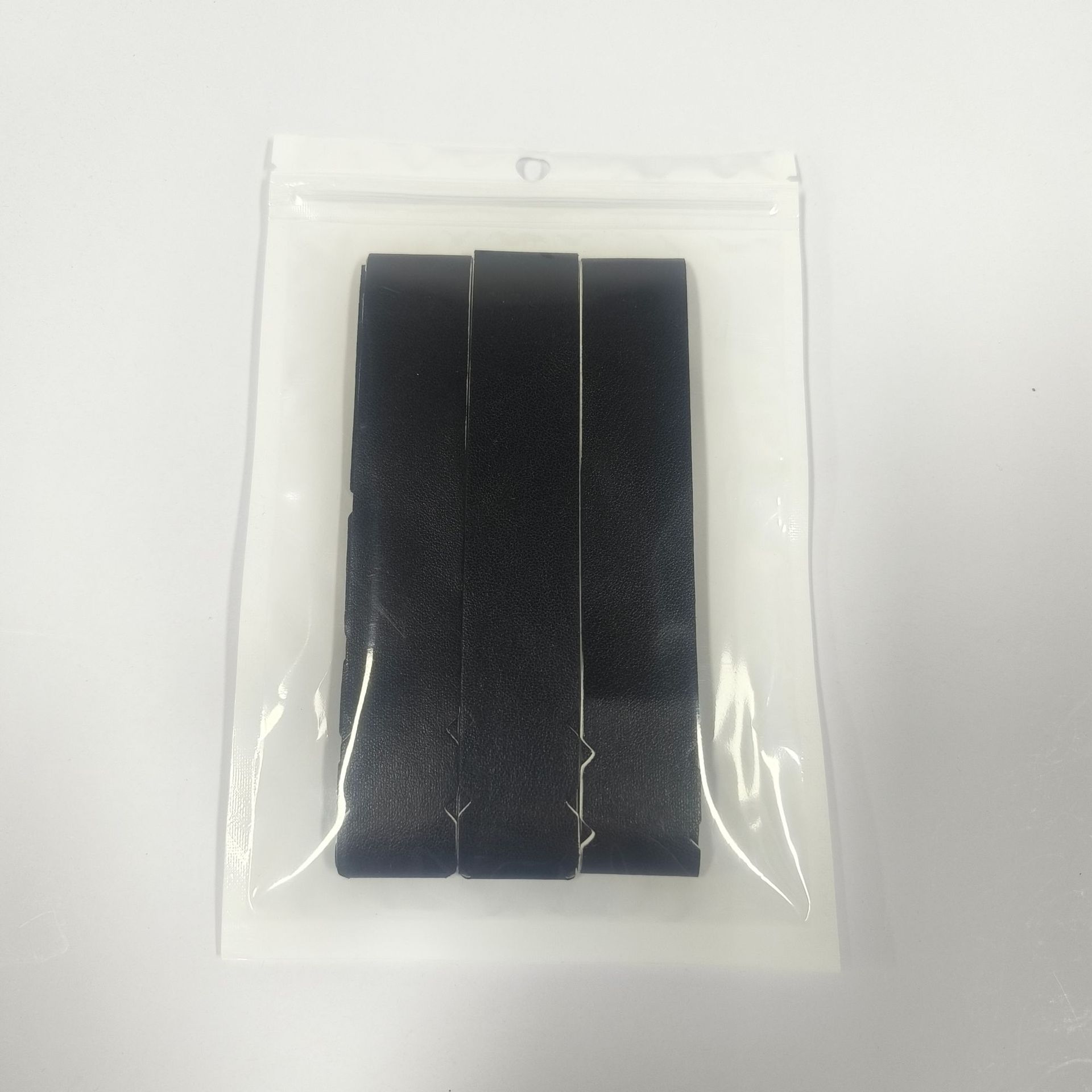 A Pack Of Three Pickleball Racket Frame Protectors Also Known As Edge Guards