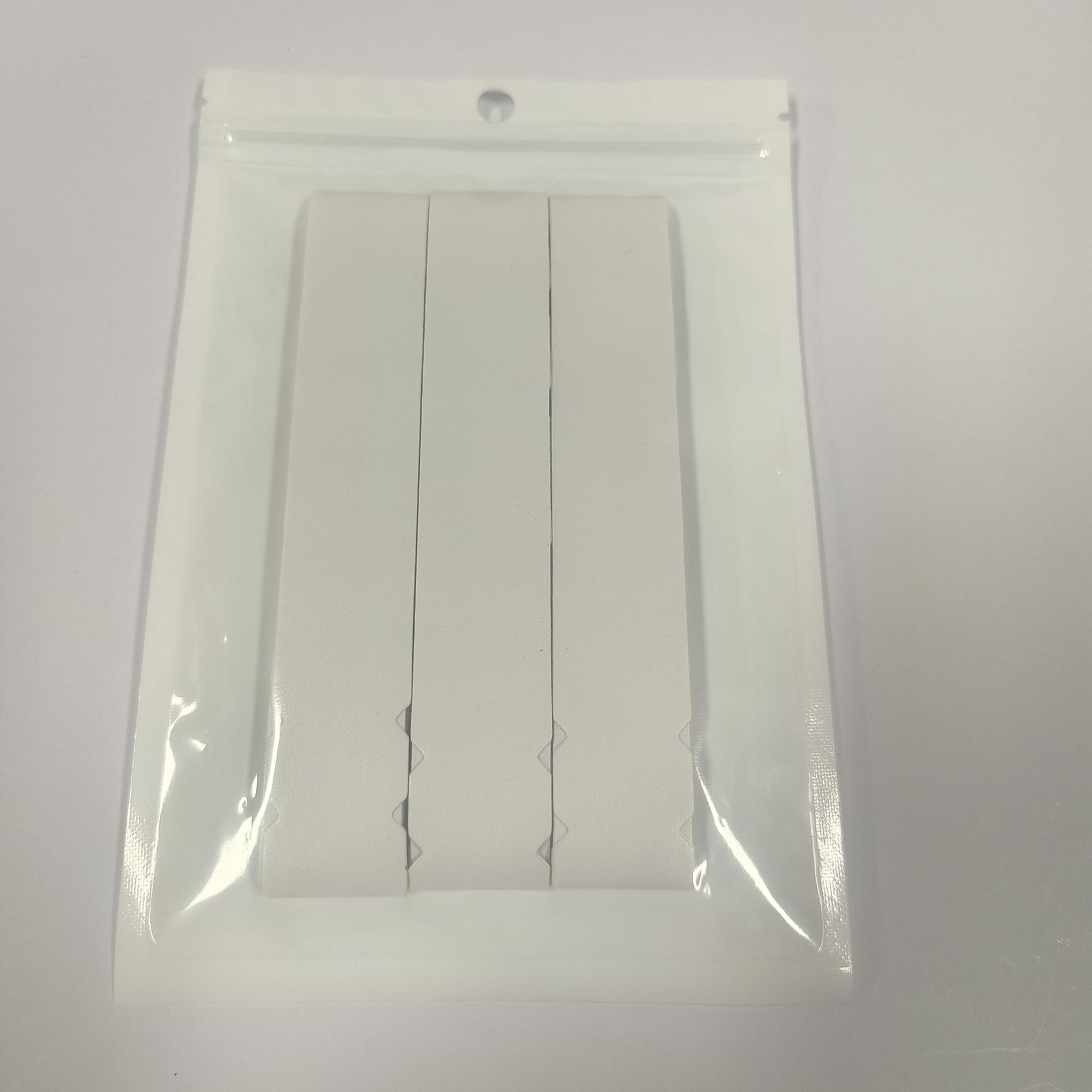 A Pack Of Three Pickleball Racket Frame Protectors Also Known As Edge Guards