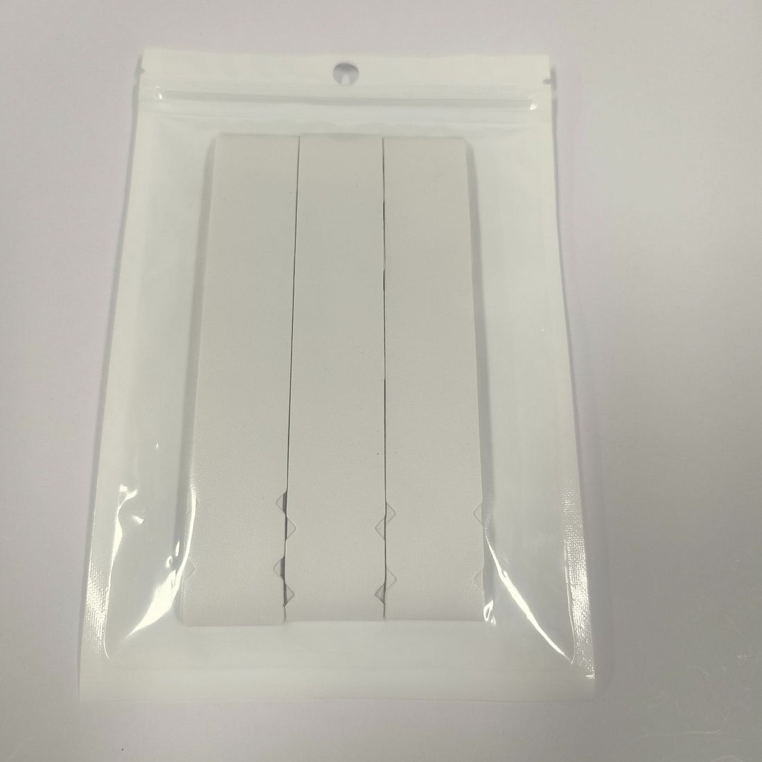 A Pack Of Three Pickleball Racket Frame Protectors Also Known As Edge Guards